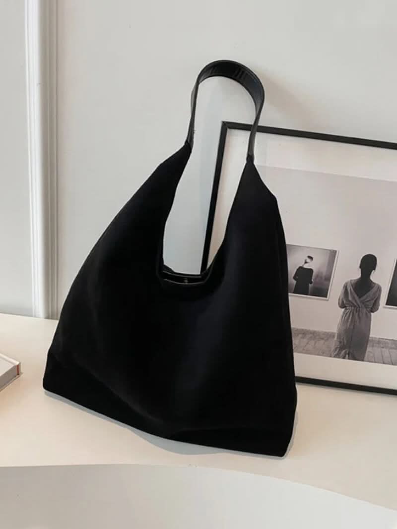 Schultertasche mit schlichtem Design und großem Hauptfach