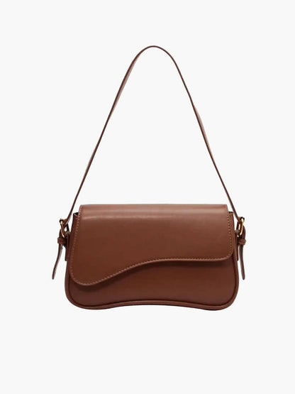 Kompakte Schultertasche mit geschwungenem Detail